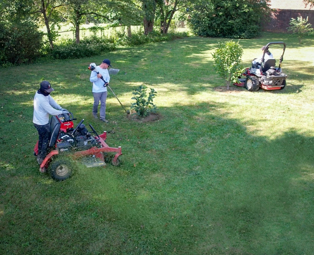 The Fransen Group mowing a residential lawn