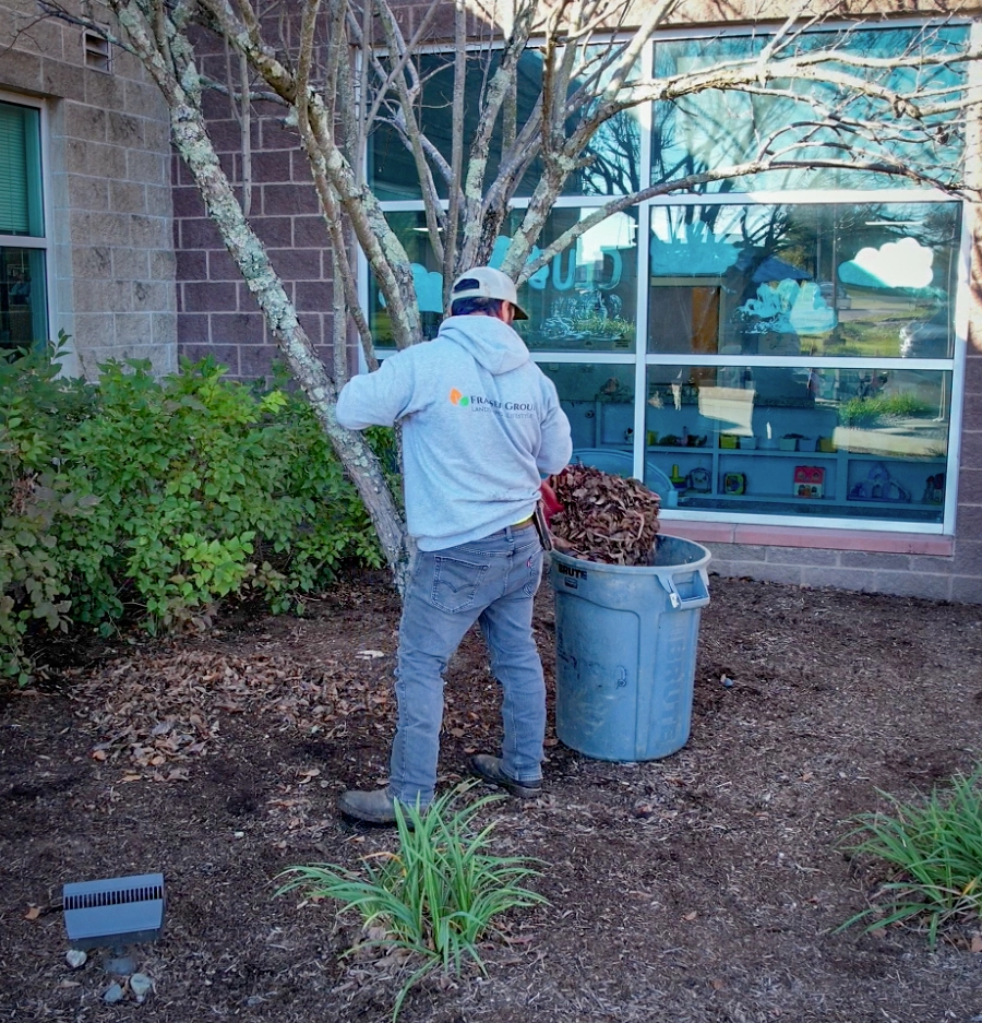 The Fransen Group Landscaping Company removing leaves